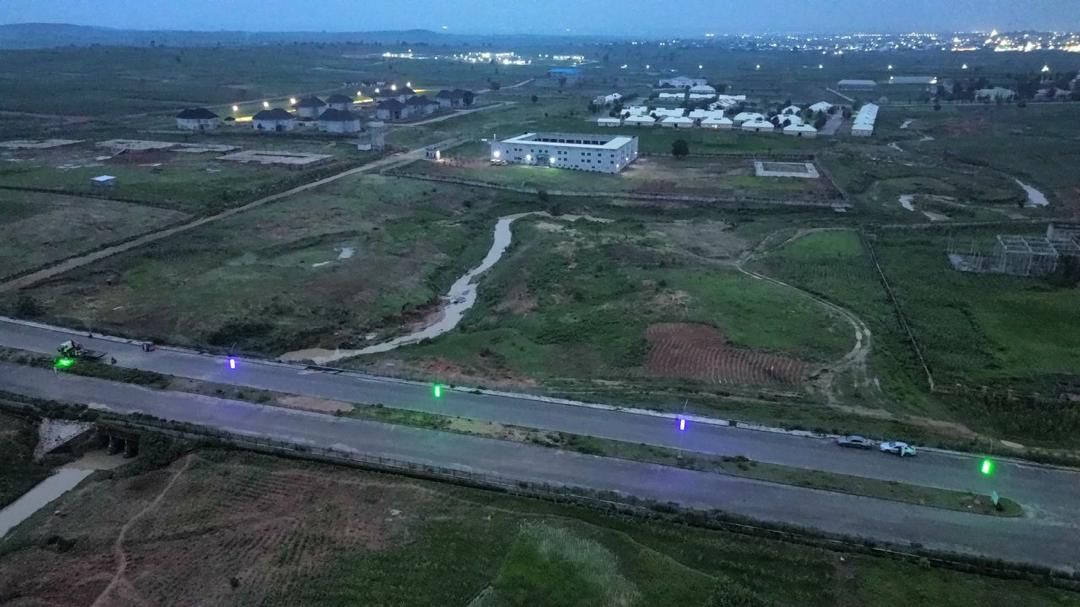 Dusk aerial view over a completed road alignment
