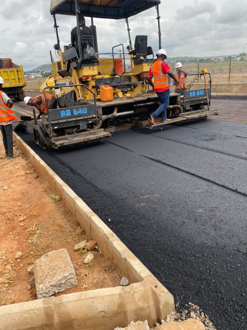 Asphalt paver laying the wearing course